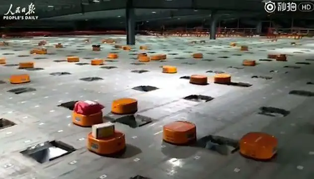 Checkout The Cutest And Hardest Working Robots In China! [Video]