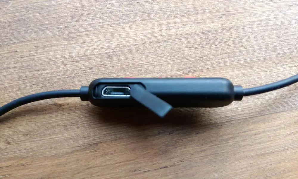 Tribit XFree USB charging flap open